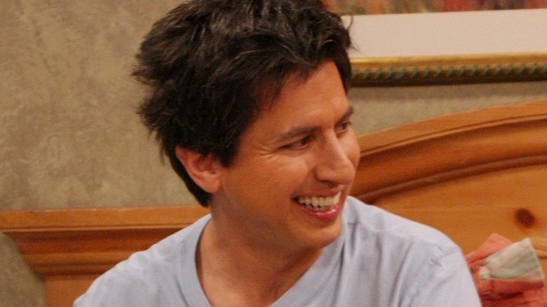 Ray Barone smiling at his wife offscreen
