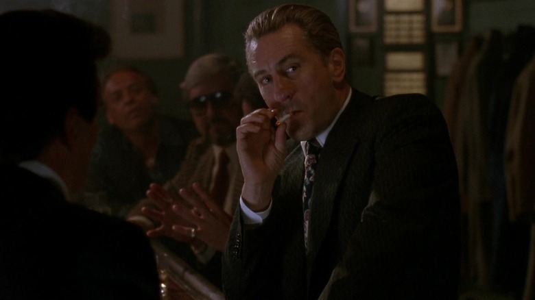 Jimmy smoking in the bar