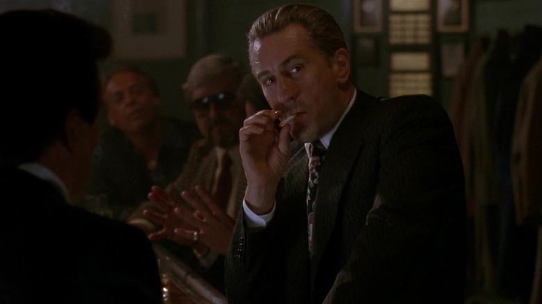 Jimmy smoking in the bar