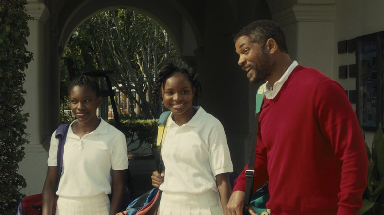 Serena, Venus and Richard standing together
