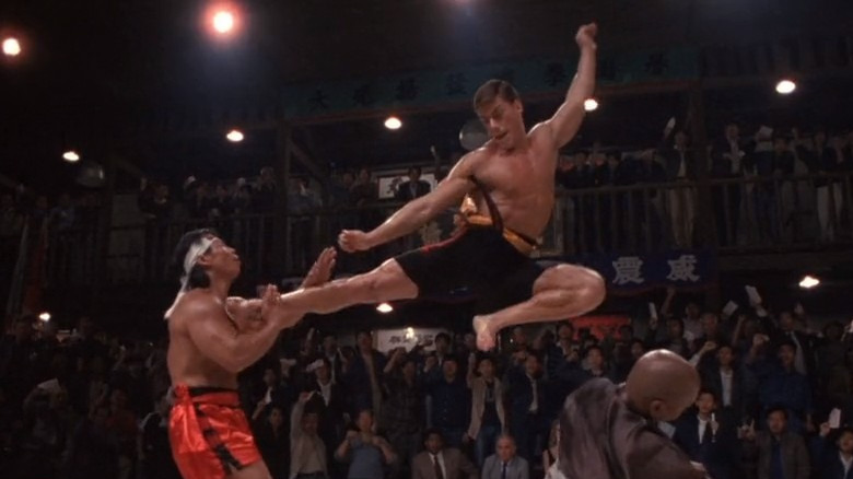 Frank Dux jump kicking his opponent 