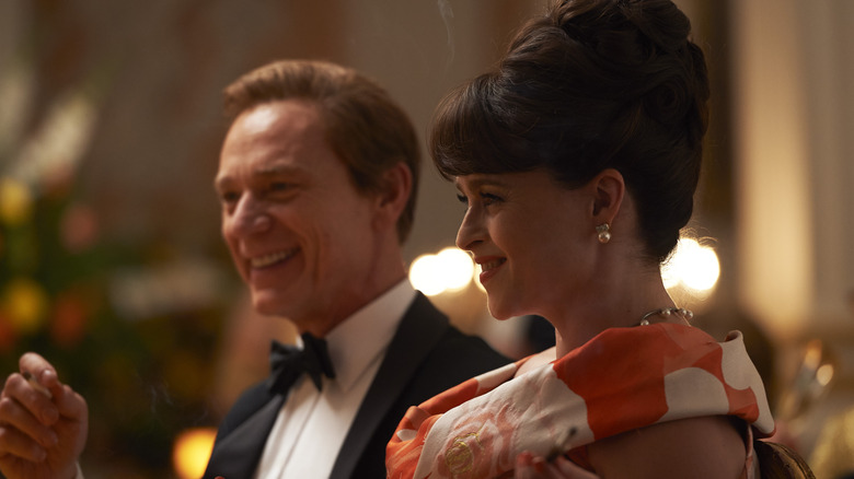 Helena Bonham-Carter and Ben Daniels smile
