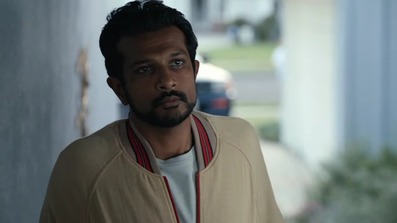 Rakesh Madhava staring