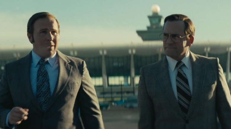 Christian Bale as Dick Cheney and Steve Carell as Donald Rumsfeld at airfield