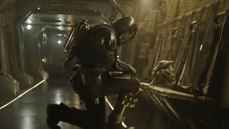 Mando preparing Grogu for a battle in "The Mandalorian and Grogu" (2026)