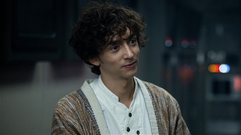 Boy Kavalier smirking in 