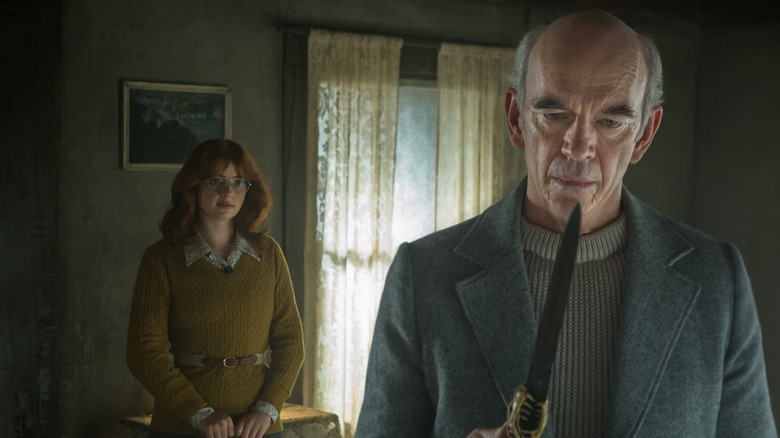 Professor Knowby holding the Kandarian Dagger in Ash vs Evil Dead