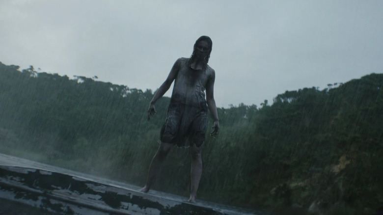 A Deadite rising from the lake in Evil Dead Burn (2026)
