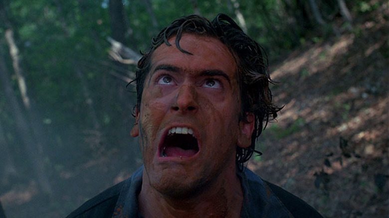 Ash screaming in the woods in Evil Dead II (1987)