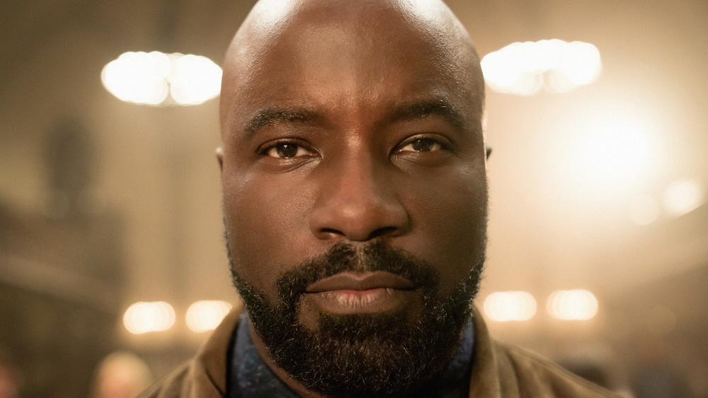 Mike Colter staring straight