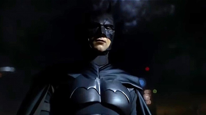 Batman lit against night