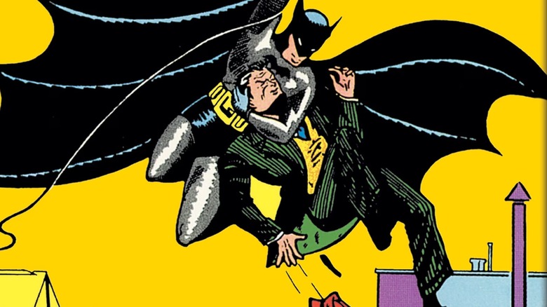 Batman putting man in headlock