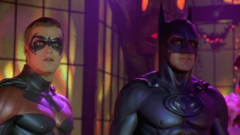 Batman and Robin together in neon lighting