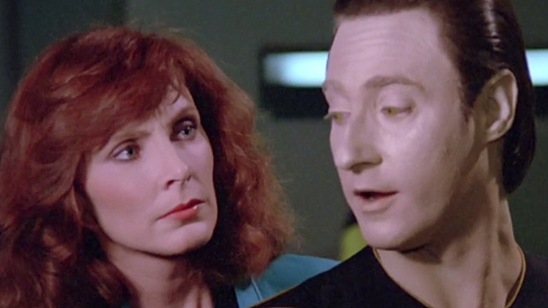 Data and Crusher looking at each other