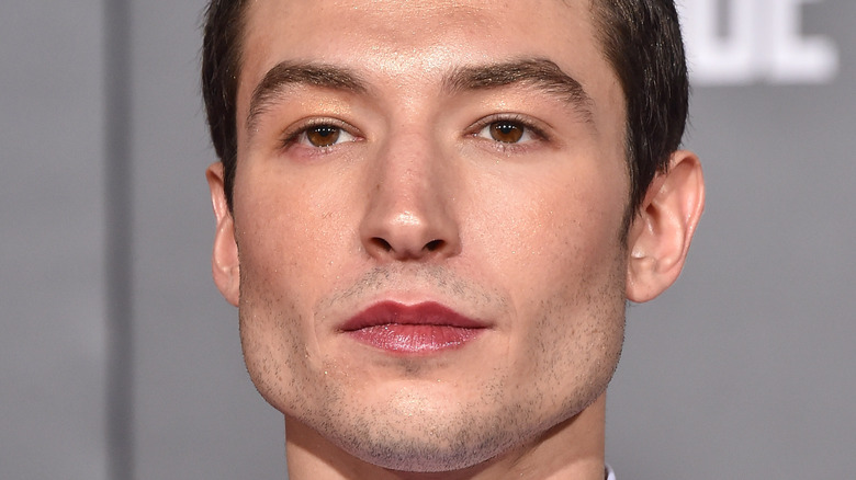Ezra Miller looking off camera