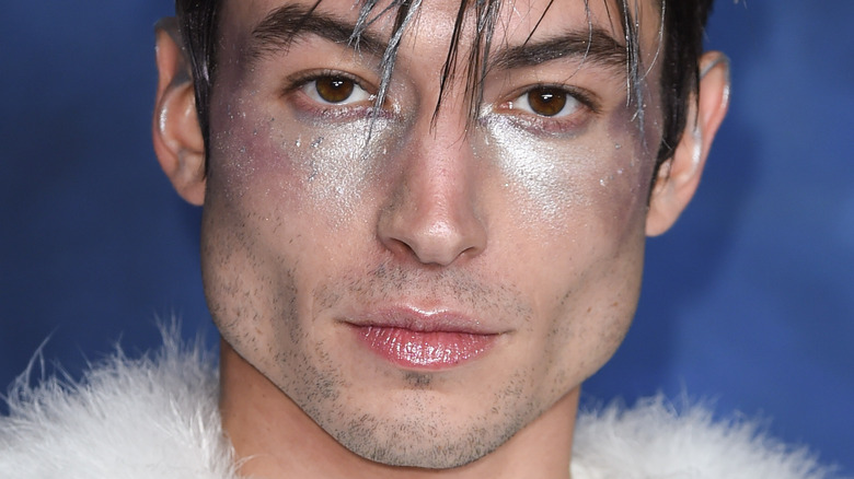 Ezra Miller posing for a photo