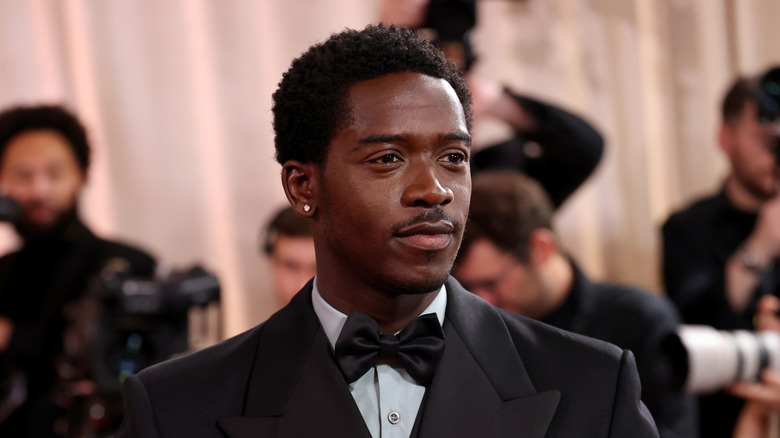 Damson Idris in a suit and bowtie