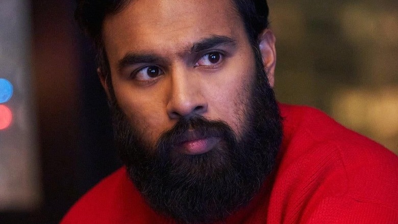 Himesh Patel looking to the side in "Station Eleven"