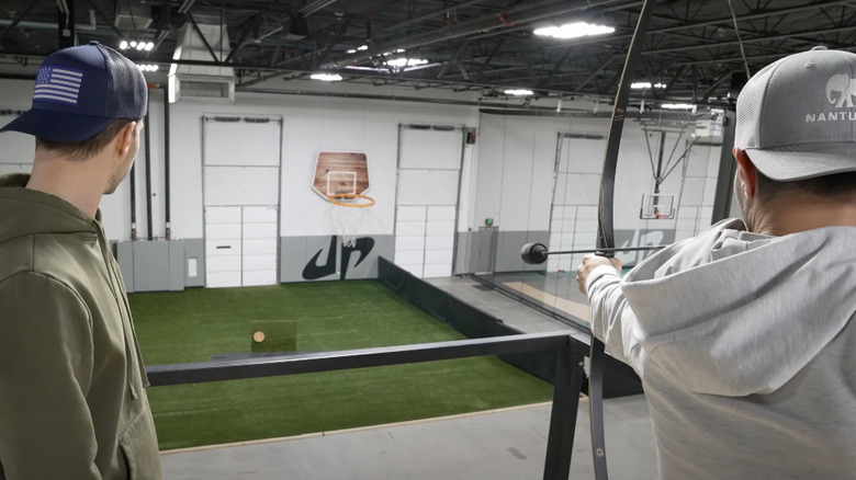 Dude Perfect shooting a target 
