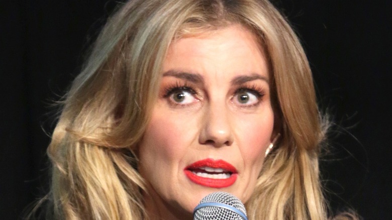 Faith Hill speaking into microphone