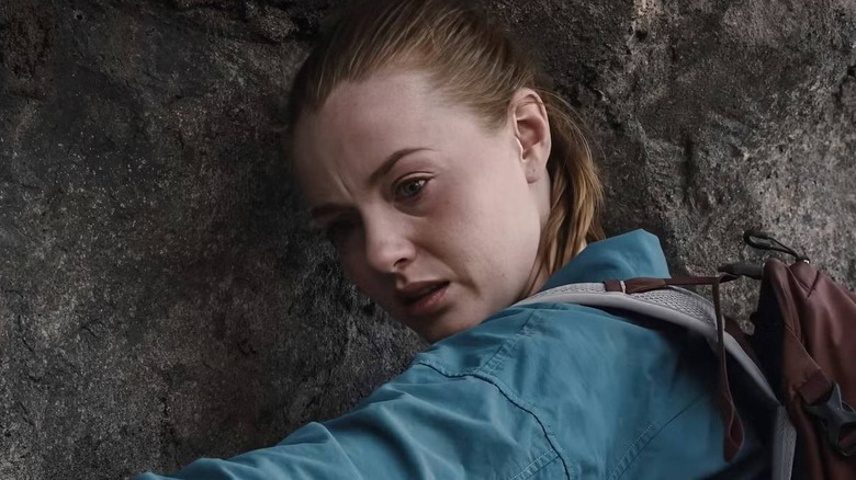 Jax looking down from a mountain in Fall 2: Deadpoint