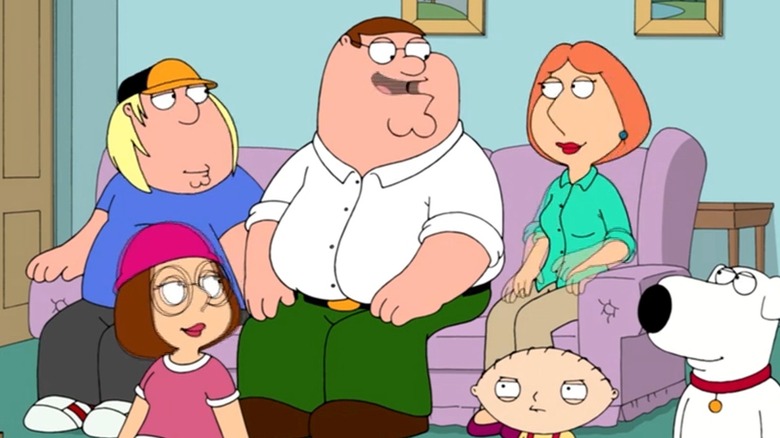 The Griffin family sits on couch in still from Family Guy