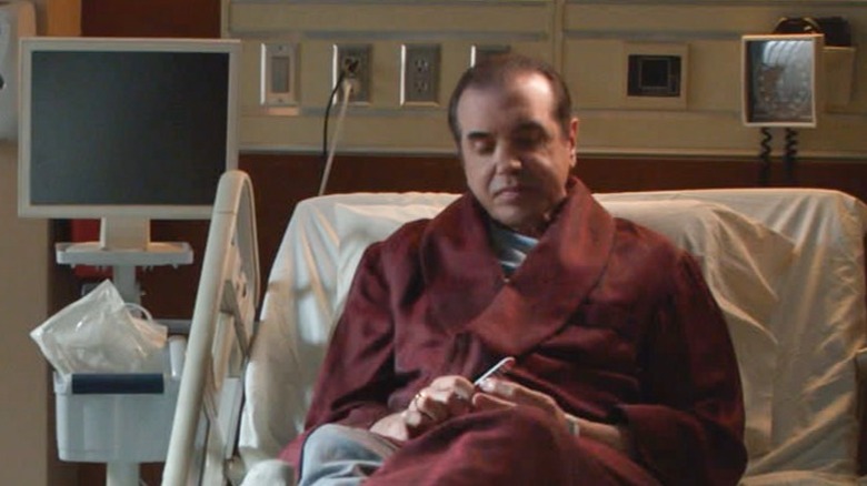 Chazz Palminteri filing his nails in a hospital bed