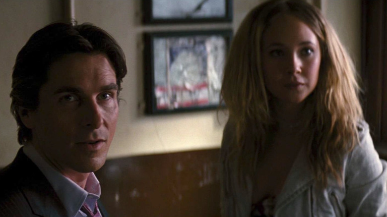 Jen and Bruce Wayne look surprised