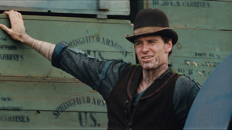 Burke leans on a crate