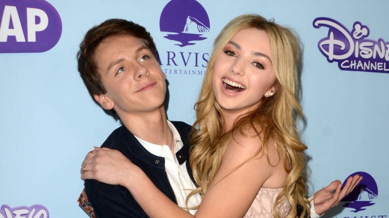 Peyton List hugs Jacob Bertrand