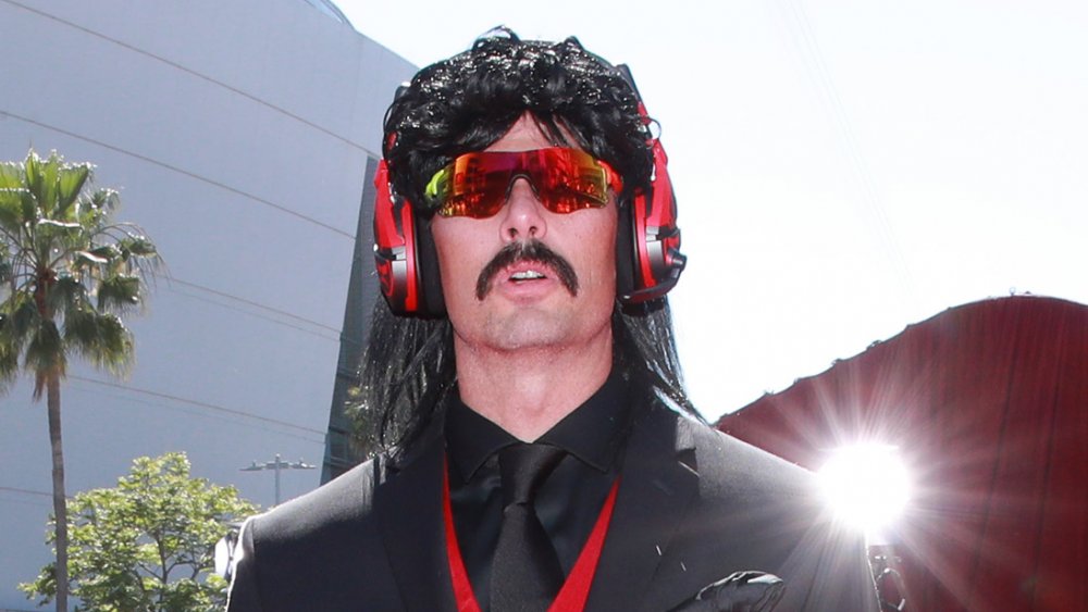 Dr Disrespect stares ahead on a Hollywood red carpet
