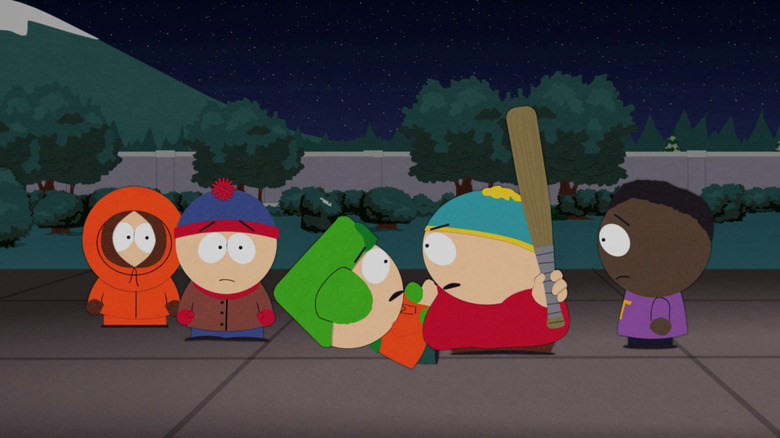 Cartman with bat while others watch