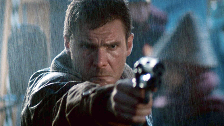 Deckard pulls a gun