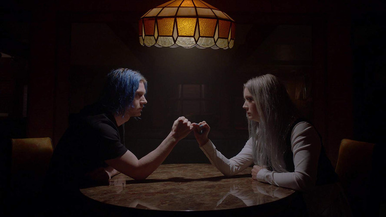 Evan Peters and Billie Lourd talking