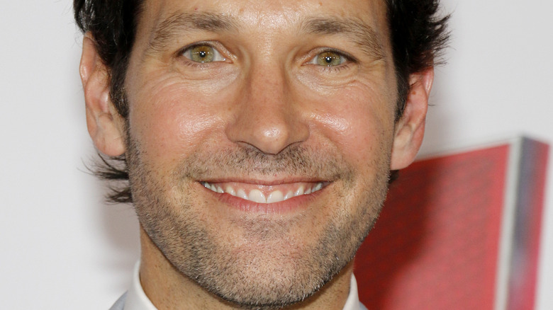 Paul Rudd grinning into camera