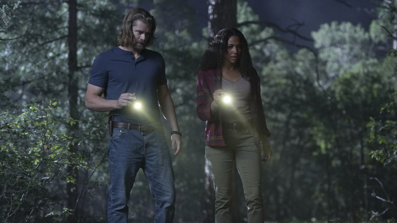 Luke Mitchell and Kylie Bunbury looking worried