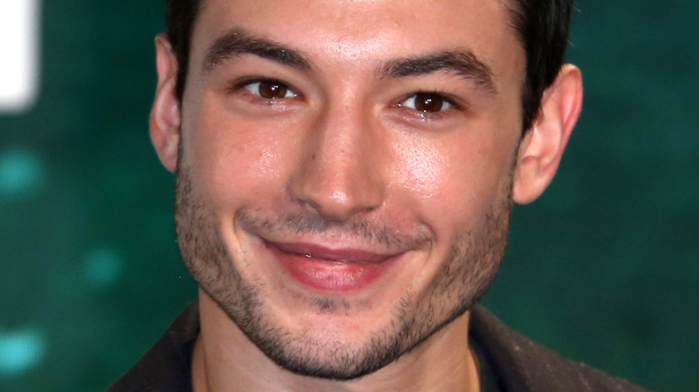 Ezra Miller smiling at an event