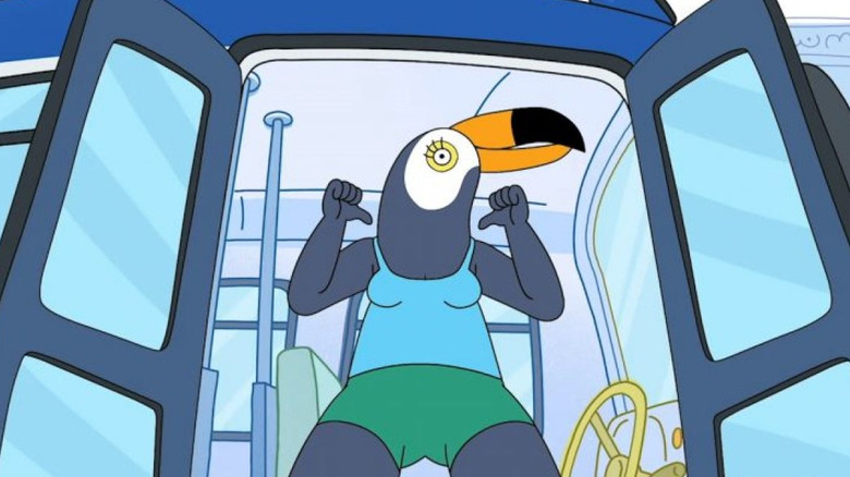 Tuca pointing at herself on bus