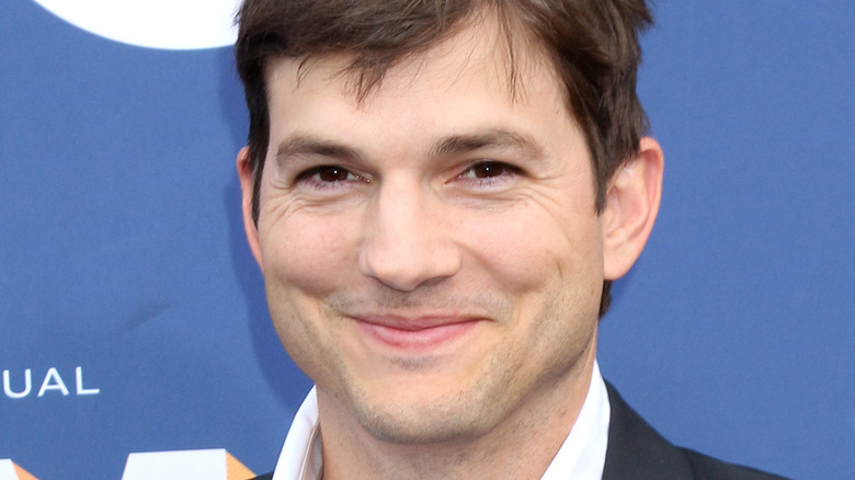 Ashton Kutcher smiling