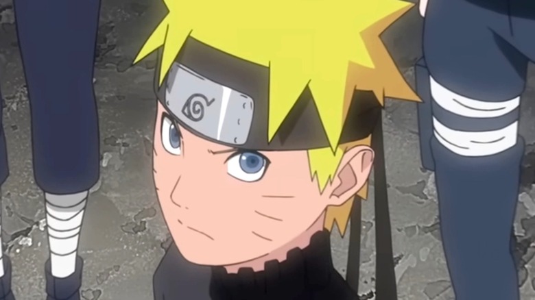 Naruto looks on with serious expression