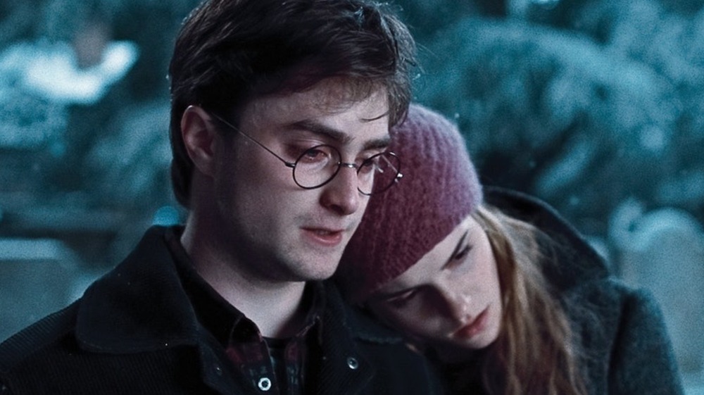 Emma Watson as Hermione and Daniel Radcliffe as Harry