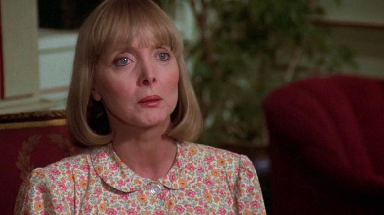 Carolyn Jones reacts with surprise