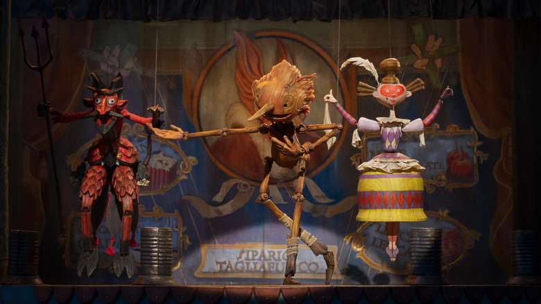 Pinocchio dancing on a stage in Pinocchio