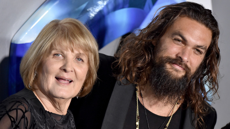 Jason Momoa and his mom Coni pose for a photo
