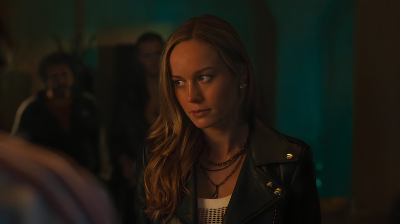 Tess looks suspicious in a bar
