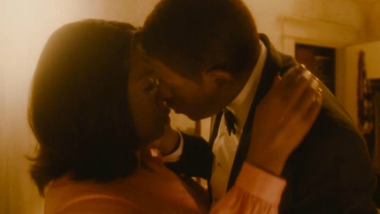 Gloria and Cecil kiss