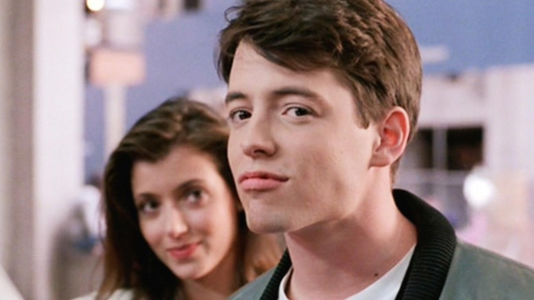 Ferris Bueller grins at camera