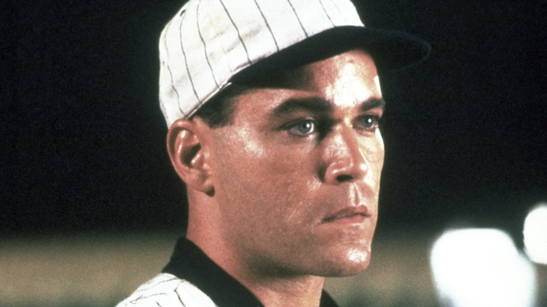 Shoeless Joe Jackson stands on a baseball field in Field of Dreams