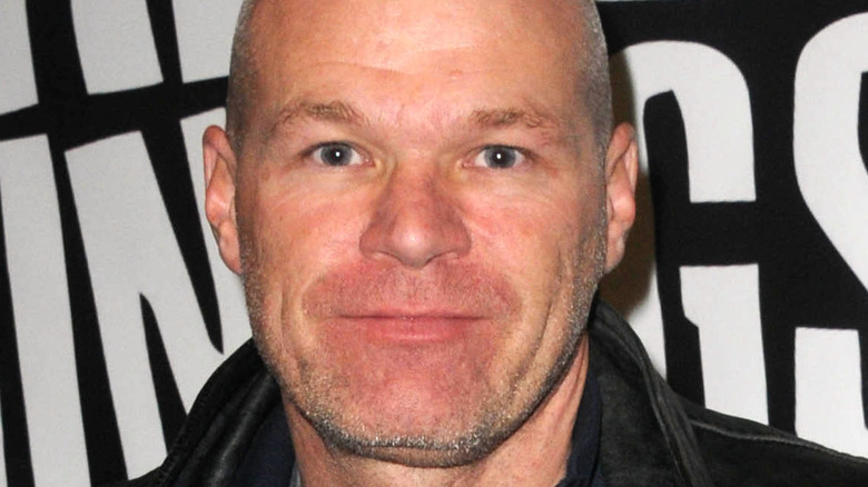 Uwe Boll in leather jacket