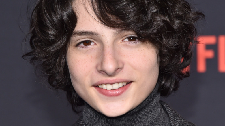 Finn Wolfhard smiling